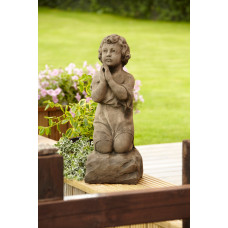 Praying Girl On Rock